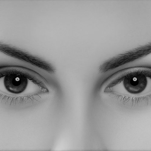 Close up image of female brown eyes